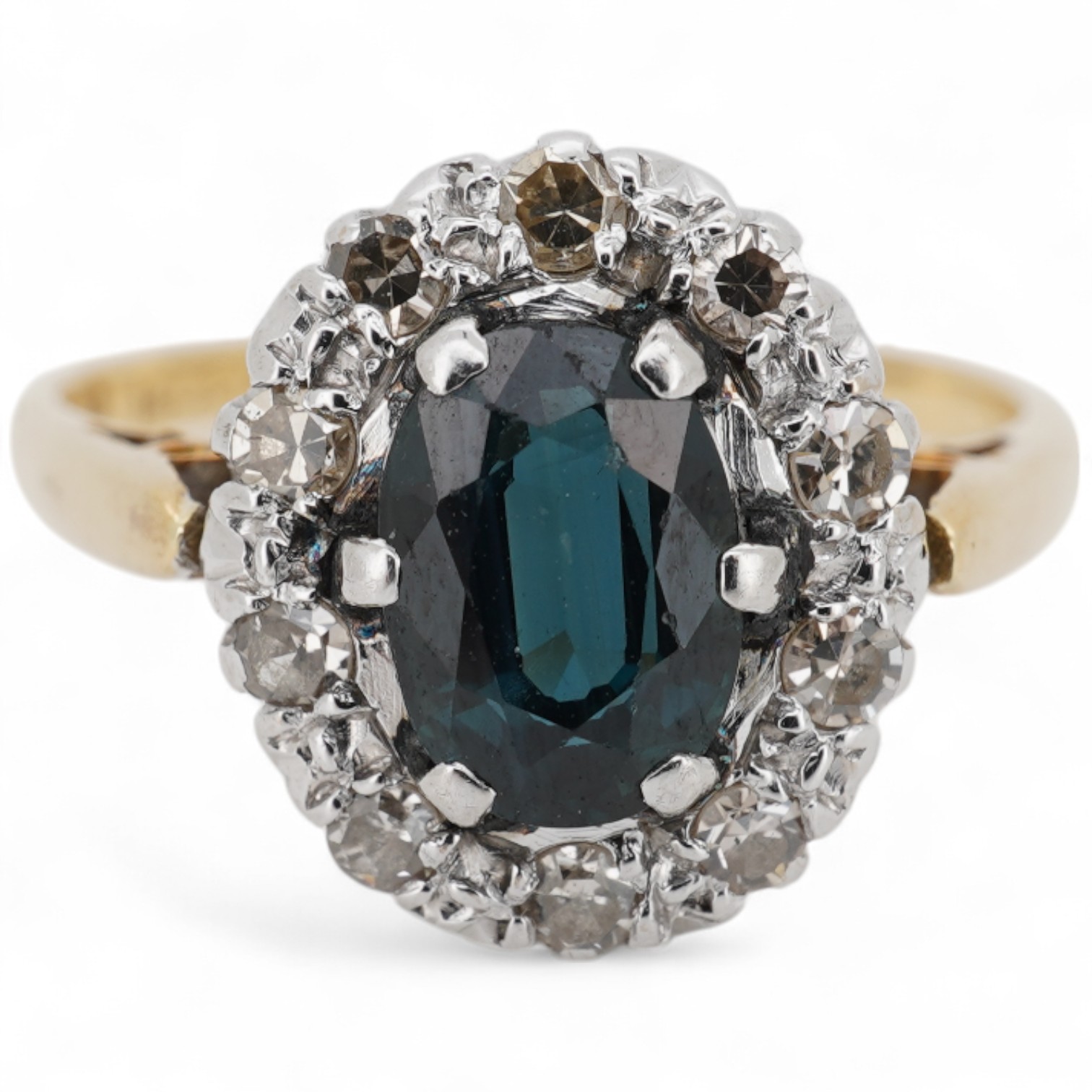 A mid 20th century 18ct and plat, sapphire and diamond set oval cluster ring, size K, gross weight 2.9 grams.